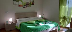 Postel nebo postele na pokoji v ubytování B&B LE BACETTE