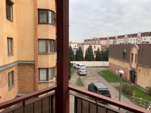 a view of a parking lot from a balcony at APARTAMENT GERSONA in Bydgoszcz