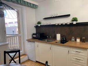 Kuchyňa alebo kuchynka v ubytovaní APARTAMENT GERSONA