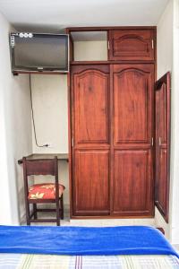 Postel nebo postele na pokoji v ubytování Victoria Imperial Hotel
