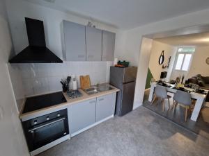 Η κουζίνα ή μικρή κουζίνα στο Haut standing Proche zone industrielle +2 φωτογραφίες