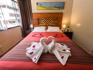 Llit o llits en una habitació de Nativus Hostel Machu Picchu