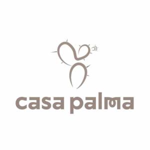 logotipo de la casa palilica con las palabras "casa palilica" en Casa Palma en São Miguel do Gostoso