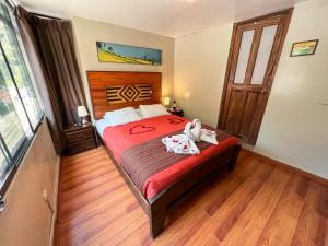Llit o llits en una habitació de Nativus Hostel Machu Picchu