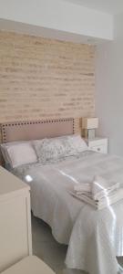 Posteľ alebo postele v izbe v ubytovaní Apartment Villegas