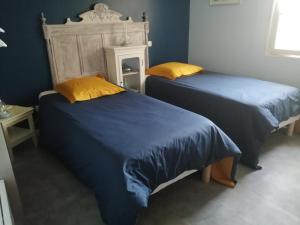 Postel nebo postele na pokoji v ubytování Ma Gentilhommière