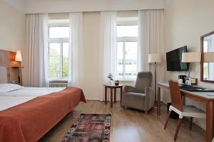 Postel nebo postele na pokoji v ubytování Elite Stadshotellet Växjö + 37 fotografií