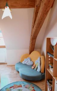a room with a bean bag bed in a attic at Bayerischer Hof Spalt in Spalt