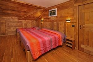 Postel nebo postele na pokoji v ubytování Hotel Biancaneve