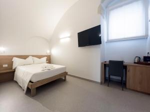 Postel nebo postele na pokoji v ubytování Dimora dei Celestini