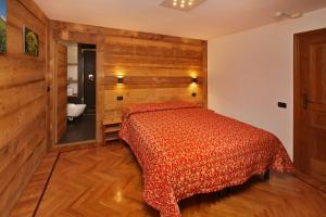 Postel nebo postele na pokoji v ubytování Hotel Biancaneve