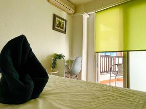 Posteľ alebo postele v izbe v ubytovaní Guest House Leo