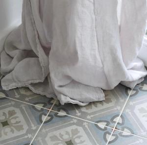 a close up of a towel on a tile floor at Harbour View House in St Ives