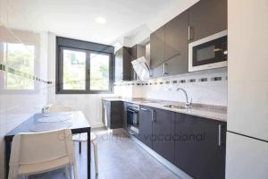 Kuchyň nebo kuchyňský kout v ubytování Jovial Estación Apartamento
