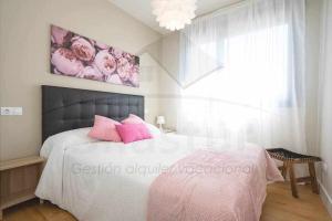 Postel nebo postele na pokoji v ubytování Jovial Estación Apartamento
