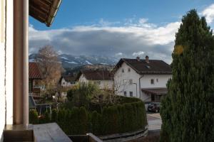 a view of a house with a christmas tree at SMS-Homes I AUSZEIT im BERGBLICKparadies in Sonthofen