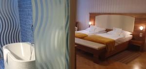 Postel nebo postele na pokoji v ubytování Hotel Okresní Dům