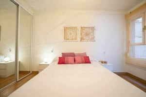 A bed or beds in a room at Monte Aurora