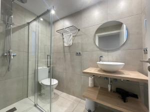 Ванная комната в Apartaments Voramar Roses