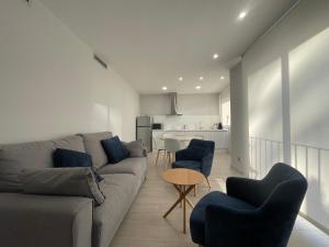 Гостиная зона в Apartaments Voramar Roses