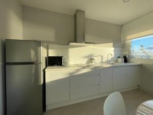 Кухня или мини-кухня в Apartaments Voramar Roses
