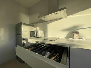 Кухня или мини-кухня в Apartaments Voramar Roses
