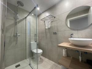 Ванная комната в Apartaments Voramar Roses