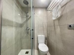 Ванная комната в Apartaments Voramar Roses