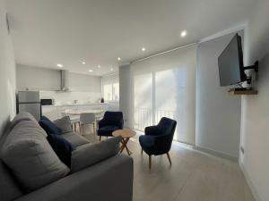 Телевизор и/или развлекательный центр в Apartaments Voramar Roses