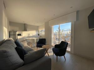 Гостиная зона в Apartaments Voramar Roses