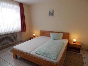 Кровать или кровати в номере Hotel Jägersruh