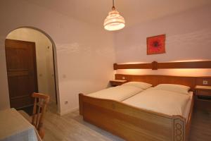 Letto o letti in una camera di Pension Riedlsperger