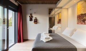 Кровать или кровати в номере Filia's Memories Apartments