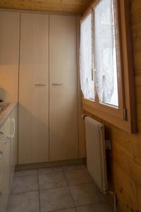 Kuchyň nebo kuchyňský kout v ubytování Chalet Weisshorn 3