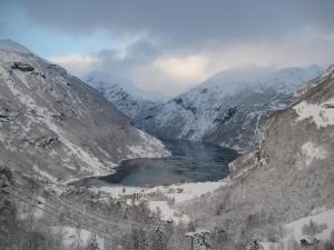 a view of a river in a snowy mountain at Lunheim in Geiranger in Geiranger
