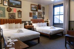 Postel nebo postele na pokoji v ubytování KEX Hotel + 37 fotografií