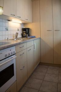Kuchyň nebo kuchyňský kout v ubytování Chalet Weisshorn 5