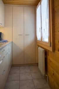 Kuchyň nebo kuchyňský kout v ubytování Chalet Weisshorn 5