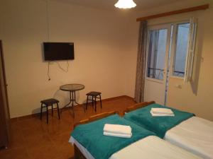 Letto o letti in una camera di Nika Inn Kobuleti