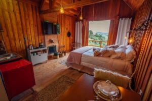 TV a/nebo společenská místnost v ubytování Montanha Home