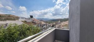 a view of a city from the balcony of a building at Virrey del Pino - Apartamento en Baena in Baena