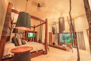 Postel nebo postele na pokoji v ubytování Oriundo Luxury Nature Villas
