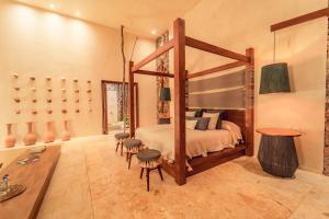Postel nebo postele na pokoji v ubytování Oriundo Luxury Nature Villas