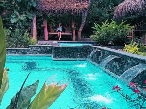 The swimming pool at or close to Habarana Tree House Ambasewana Resort