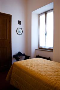 Posteľ alebo postele v izbe v ubytovaní Agriturismo La Malcontenta e il Lupo