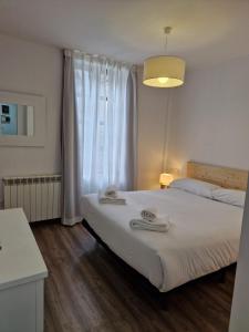 A bed or beds in a room at Eth Palai