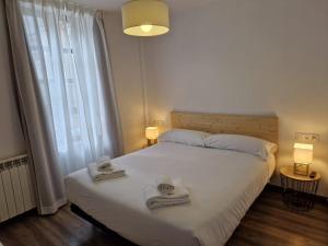 A bed or beds in a room at Eth Palai