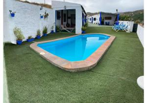 Bazén v ubytovaní Cortijo rural los Erales alebo v jeho blízkosti