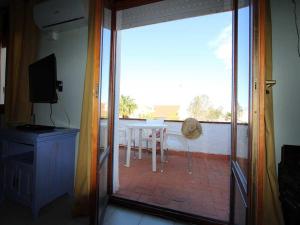 Balkón nebo terasa v ubytování Perfecto apartamento cerca del mar, ¡Mascotas bienvenidas! WiFi gratis, aire acondicionado opcional - ES-184-41