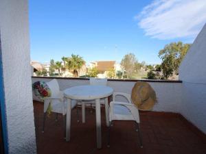 Balkón nebo terasa v ubytování Perfecto apartamento cerca del mar, ¡Mascotas bienvenidas! WiFi gratis, aire acondicionado opcional - ES-184-41